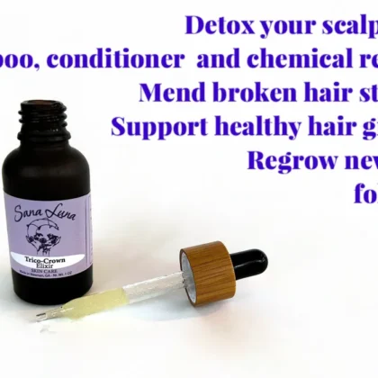 A bottle of hair growth oil with a dropper.