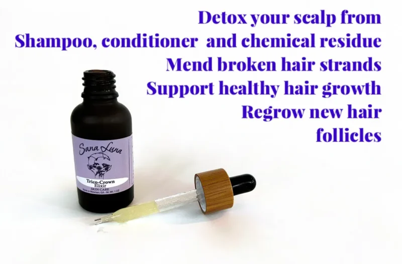 A bottle of hair growth oil with a dropper.